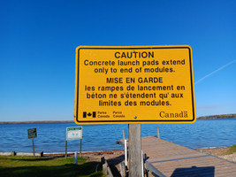 Boat launch caution sign.