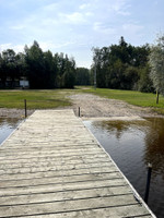 Cement boat launch and dock.