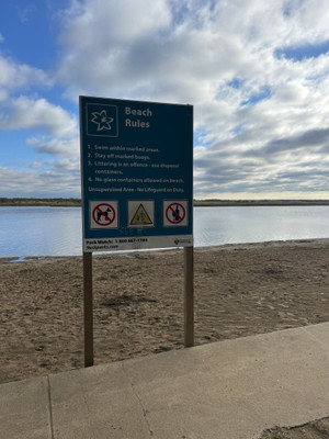 Beach rules sign.