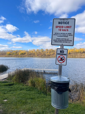 Signs at boat launch.