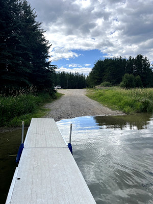 Sand boat launch and dock.