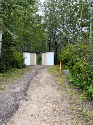 Outhouses by the beach.