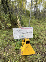 Sign near the pond saying that they plan on not stocking the pond in the future.