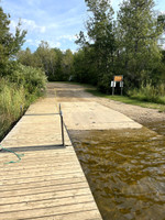 Cement boat launch and dock.