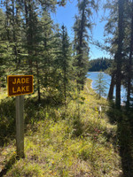 Jade Lake sign looking over the lake.