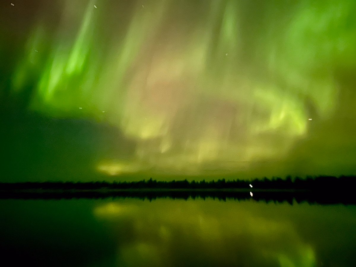 Night dance on candle by the Aurora 