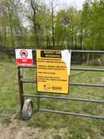 Signage at the entrance to the private road that leads to the lake.