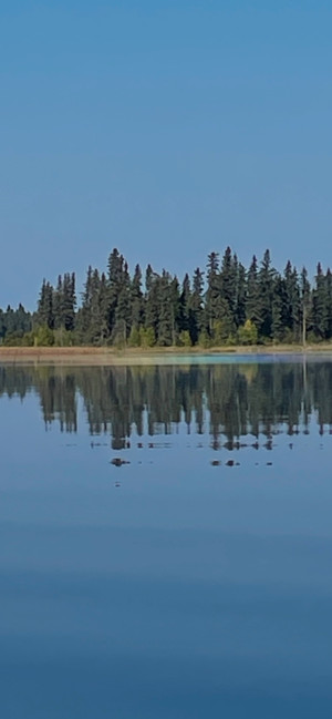 Rainbow on the water at Anglin Lake photo by Diane Chubak 