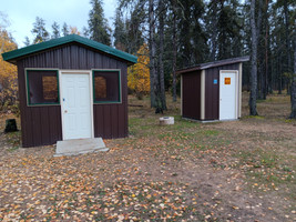 Fish filleting shack and outhouse.