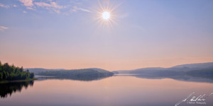 relaxing during morning coffee to a sunrise