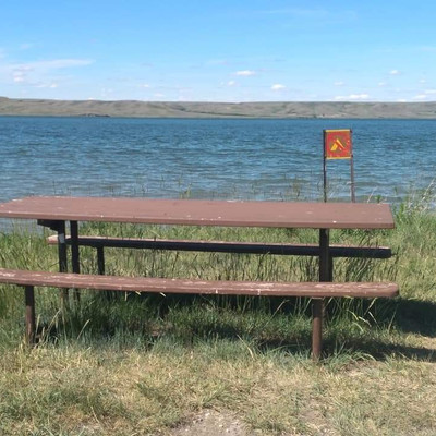 Picnic table near the water at Cypress Lake Recreation Site