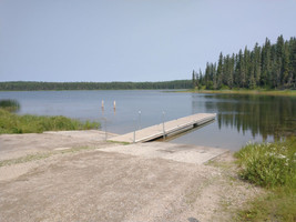 Double cement launch with dock.