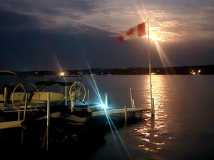 Oh Canada....moon over flag on Balone Beach September 11th 10pm