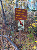 Trail closed signs.