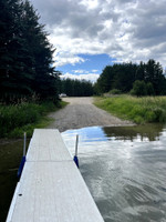 Sand boat launch and dock.