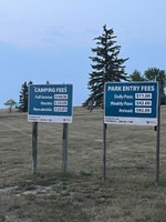 Camping fees sign.