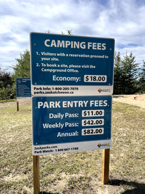 Camping fees sign.
