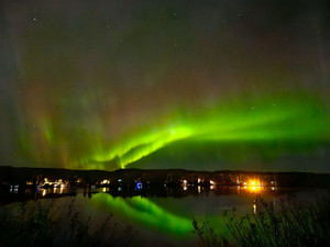 Northern lights reflecting in the lake @saskstormchaser 