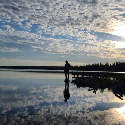 I was walking along the beach when I looked up to see my husband had stepped onto a rock. I had to capture the reflection. 