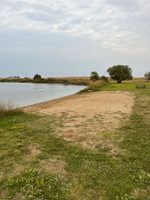 Small sandy beach.