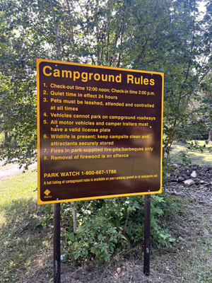 Campground rules sign.