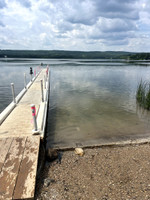 Dock and cement ramp at boat launch.