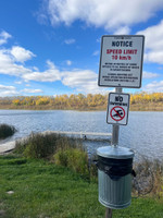 Signs at boat launch.