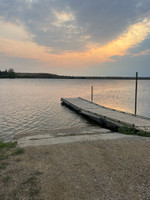 Cement launch and wooden dock.