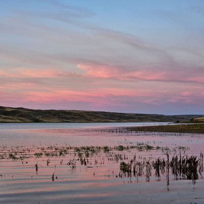 The Sunsets Alpenglow over the Lake 