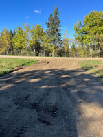 Gravel parking area.