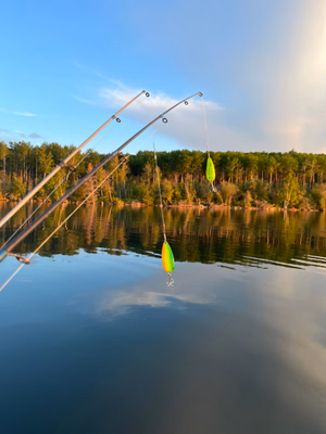 Fishing out of a Rubber blow up boat with a small electric motor with my best friend. 2 girls who love to fish!