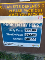 Fee sign at the parking lot.