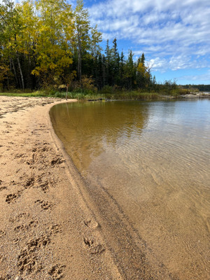 Sandy beach with nice clear water.