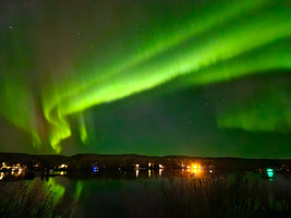 Northern Lights reflecting in the lake @saskstormchaser 