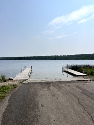 Double cement launch with two docks.