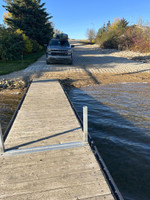 Cement boat launch and dock.