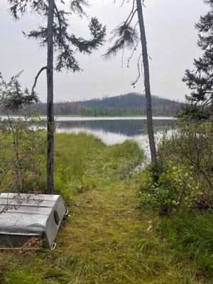 First access point to the water with locked up fishing boat (other boats are near the filleting table ~100m further).