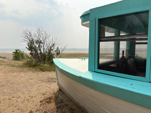 Beautiful lake with hidden gem. This 1929 tour boat as restaurant setting area. 