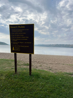 Beach rules sign.