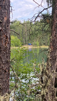 View of the 2 camp sites from across the lake.