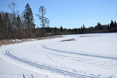 Double nordic track and a skate ski track groomed on the lake.