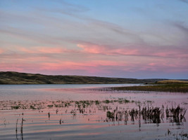 The Sunsets Alpenglow over the Lake 