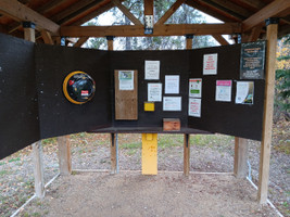 Defibrillator and signs at the campground.