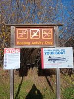 Signage at the boat launch.