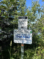 Signage at boat launch.