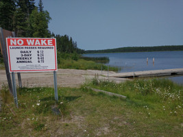 Fee signage for boat launch.