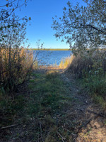 Primitive boat launch/lake access.