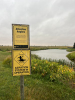 Pond warning signs.