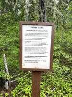 Informational sign at the lake. First stocked in 1992. No gas motors, electric motors/paddles only.