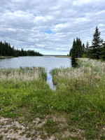 Water access for canoe at the dam parking lot.